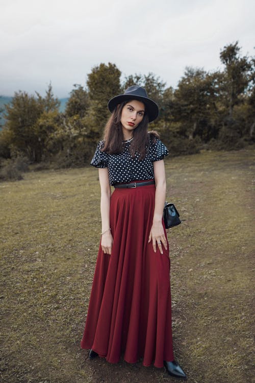 Elegant Woman on a Meadow 