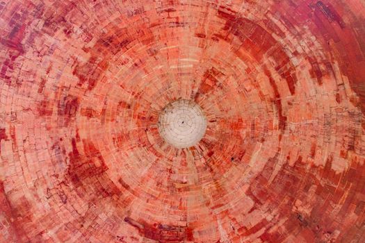 A stunning circular pattern of red bricks from a historic dome in Delhi, capturing heritage architecture.