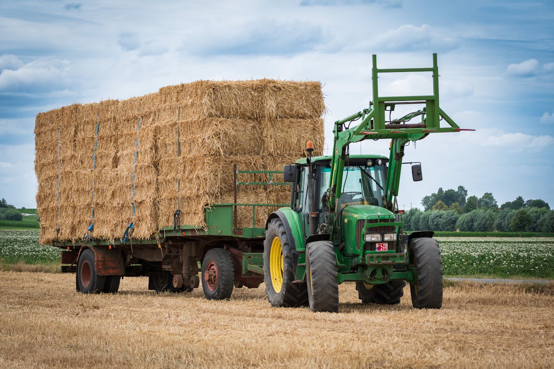 Green Tractor with Cubes of Hay