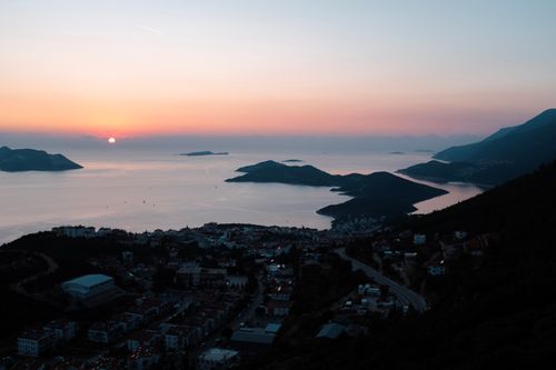 Free Breathtaking sunrise view over Kaş, Antalya, highlighting the serene coastline and islands. Stock Photo
