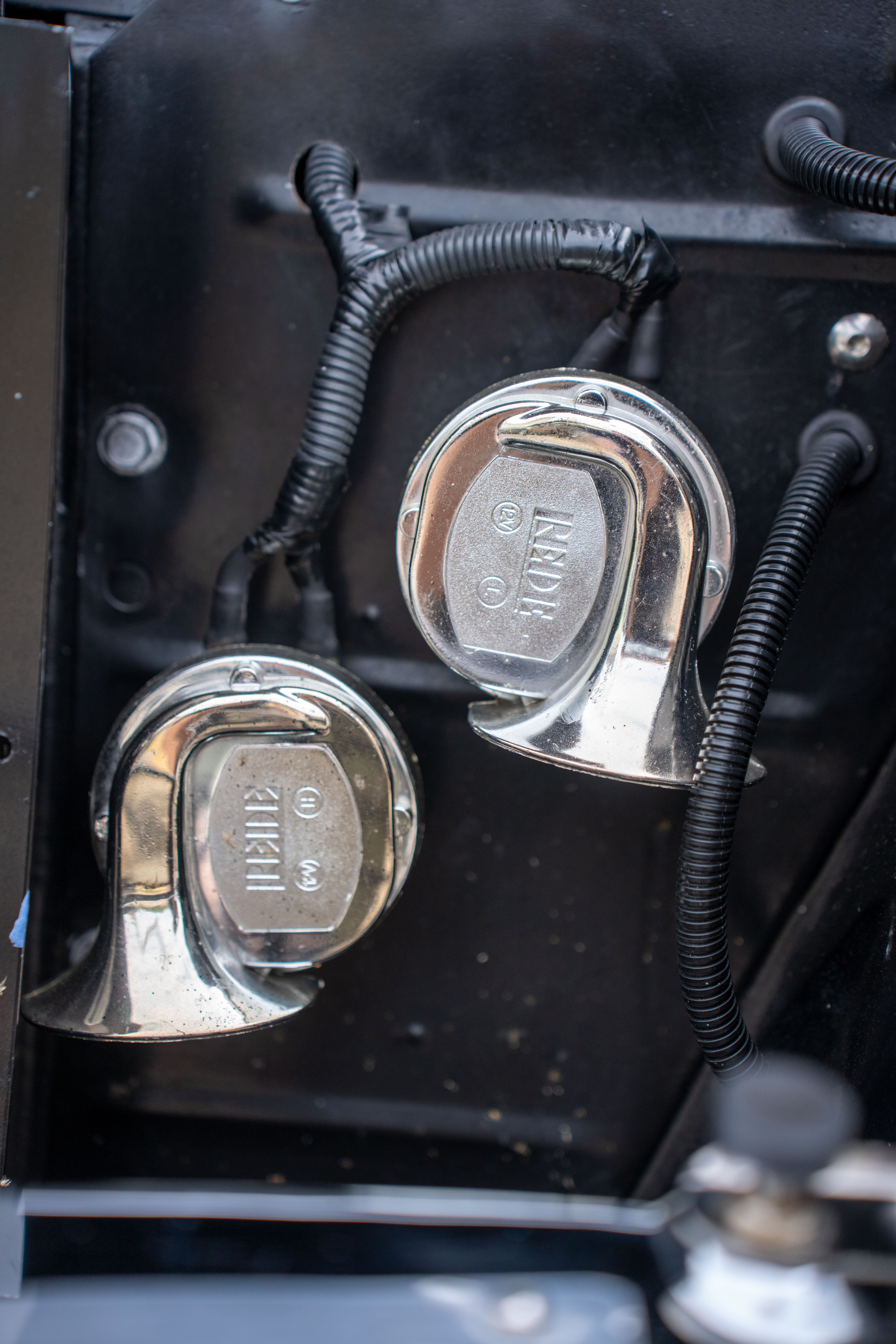 Closeup of Metal Bells in a Vintage Vehicle Interior · Free Stock Photo