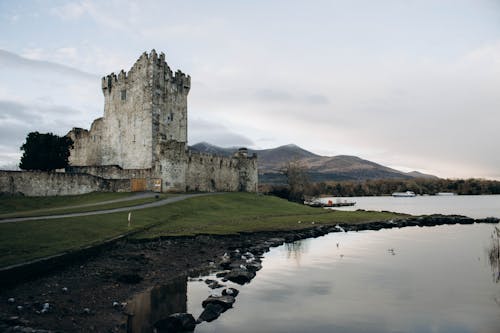 Free Scenic view of the historic Ross Castle by Lough Leane in Killarney, Ireland. Stock Photo