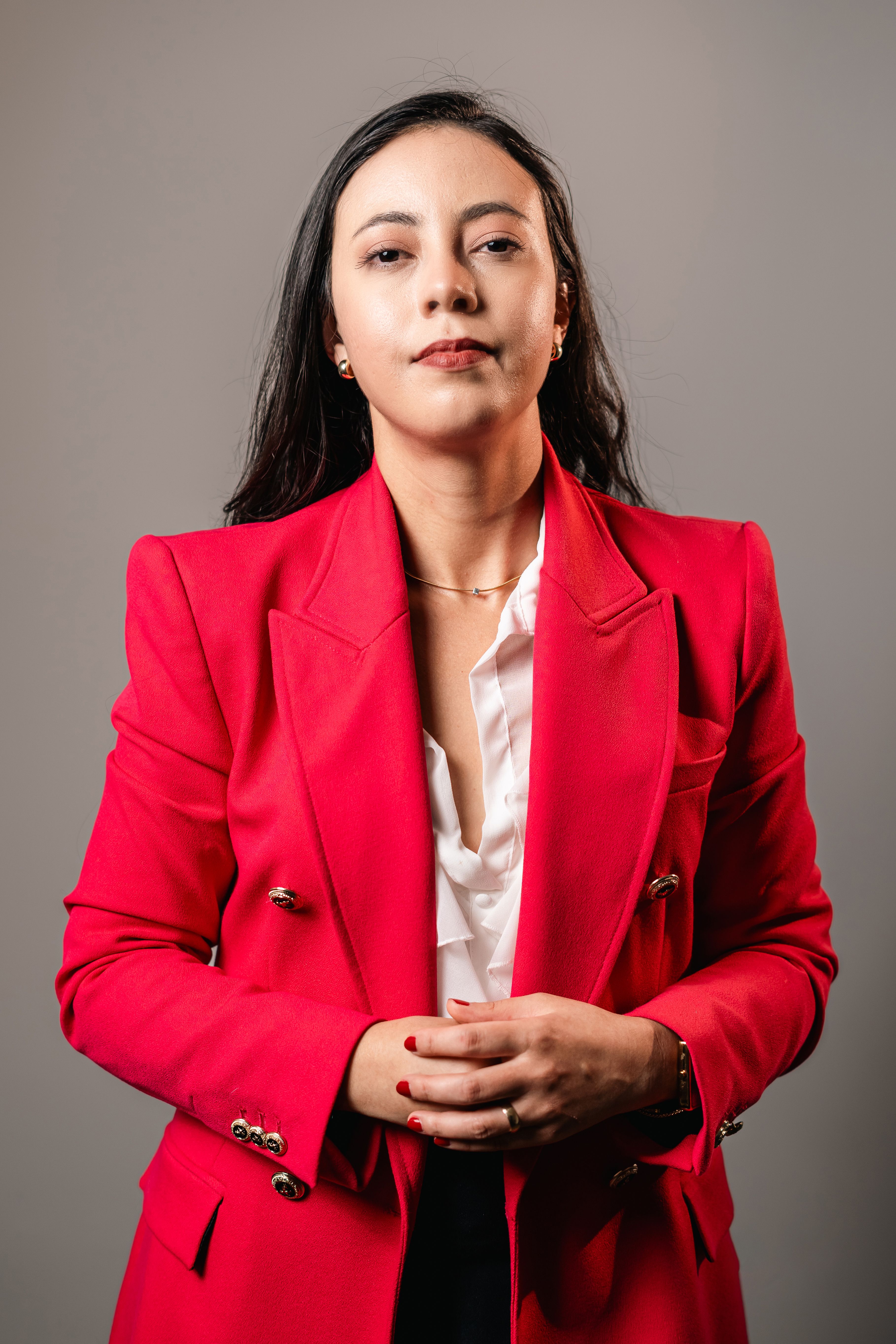 Elegant businesswoman wearing a burgundy suit