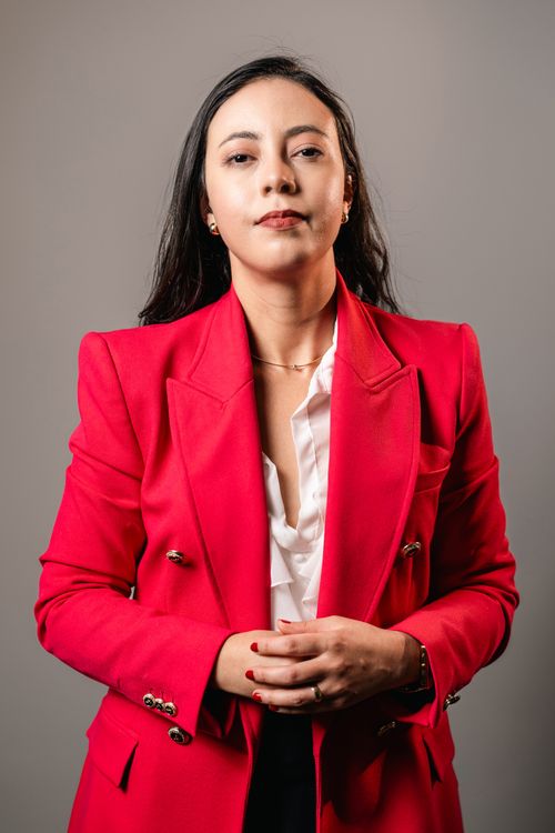 Elegant businesswoman wearing a burgundy suit