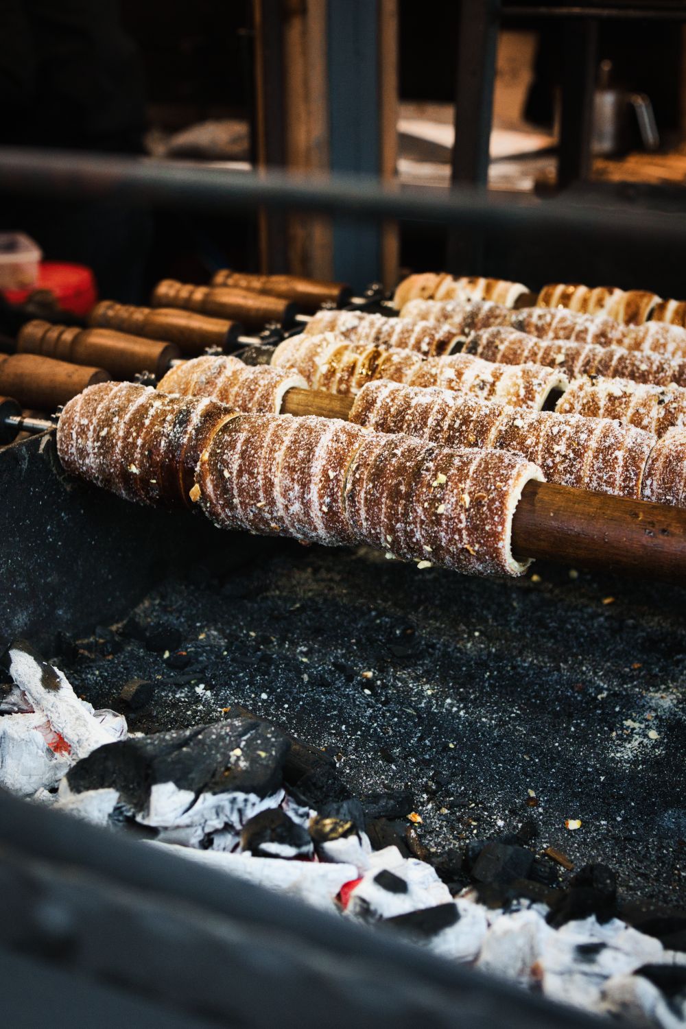 Chimney cakes baking over hot coals (placeholder photo)