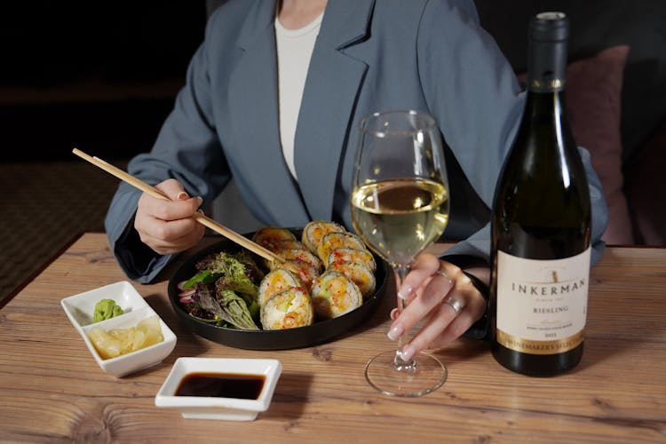 A Woman Eating Sushi