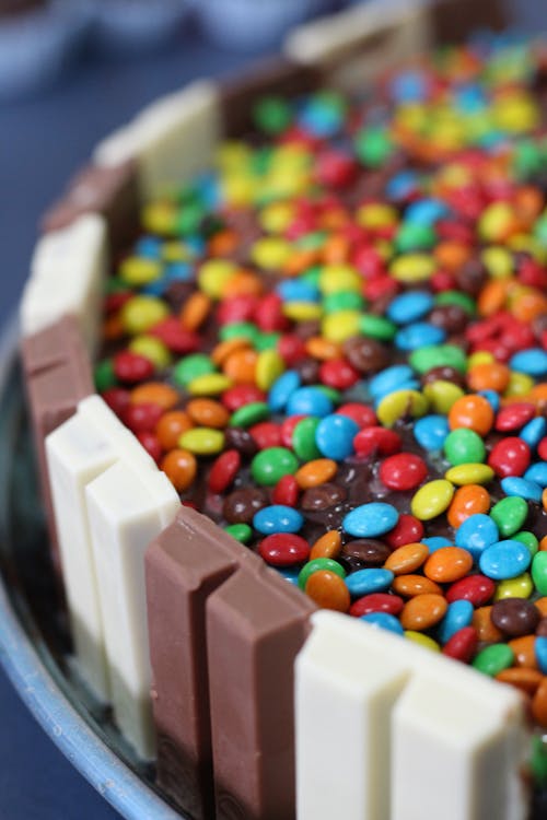 Cake of Milk and White Chocolate and Colorful Candies