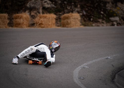 Man Sliding on a Board on a Track 