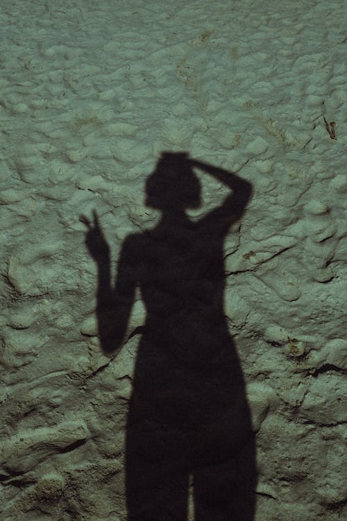 Shadow of a Woman on Sand 