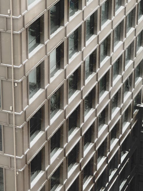 Безкоштовне стокове фото на тему «Windows, вертикальні постріл, зовнішнє оформлення будівлі»