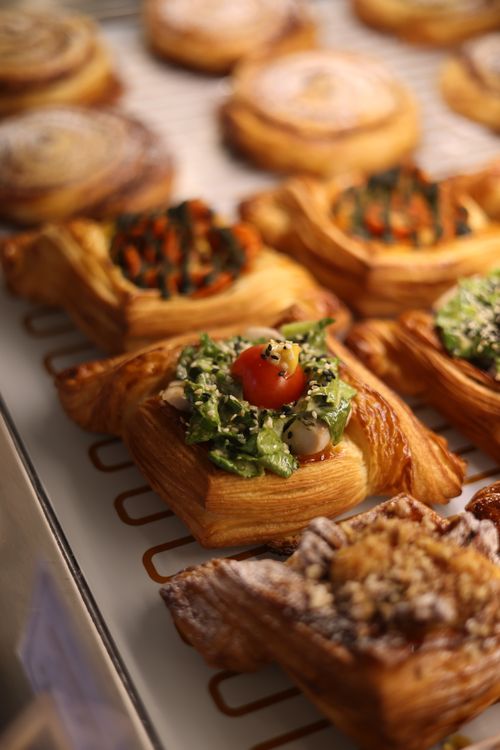 Free A selection of beautifully decorated gourmet pastries, perfect for a savory snack. Stock Photo