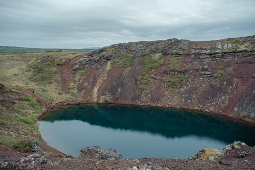 Lake in Crater in Mountains Landscape
