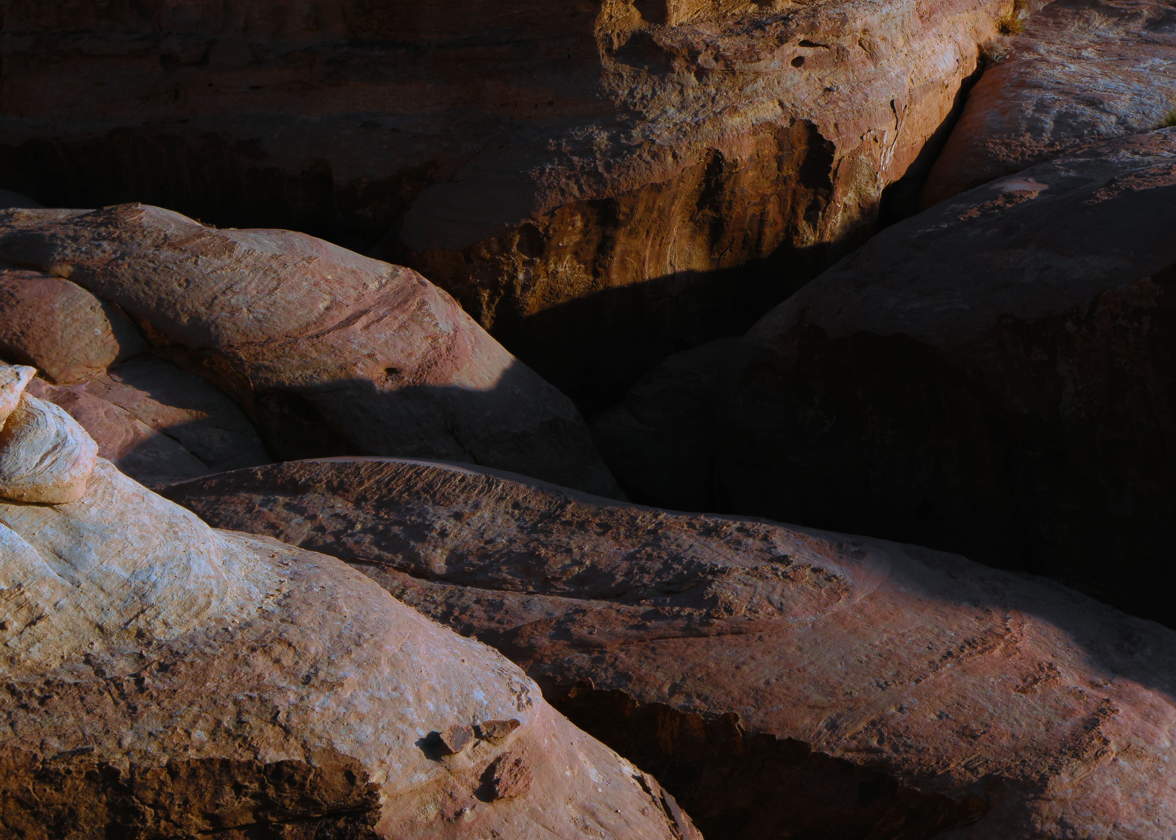 dramatic desert rock formations in the Wadi Rum valley, Jordan at sunset