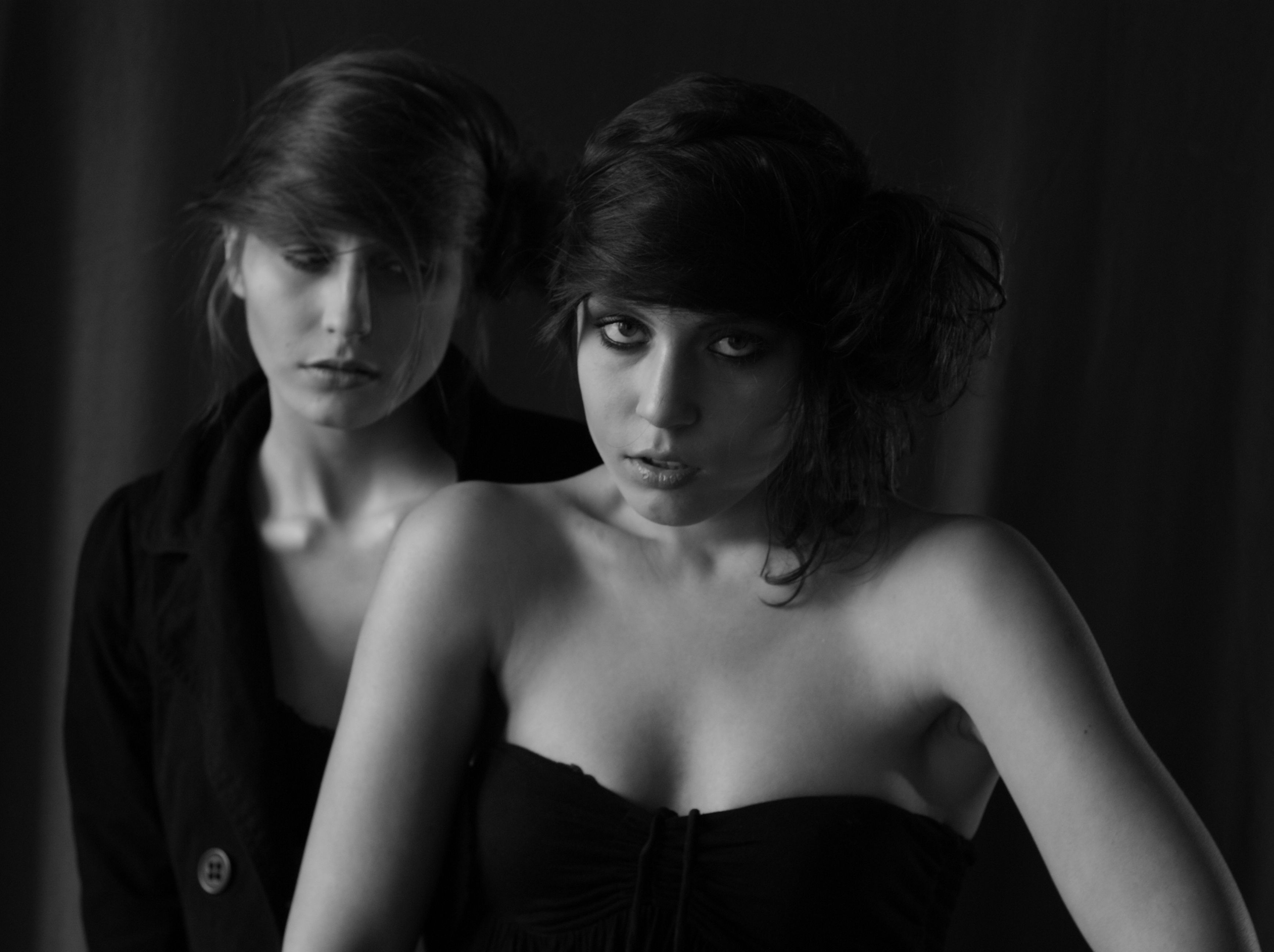 Two women in black and white posing for a photo · Free Stock Photo