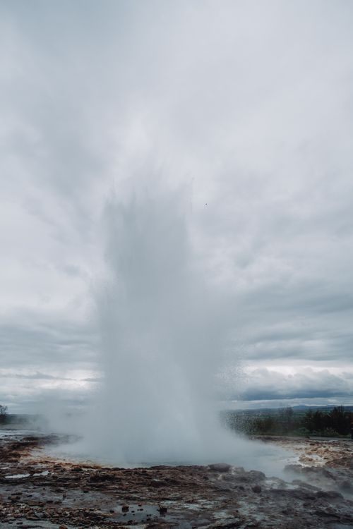 Free Captivating geyser eruption at Strokkur in Iceland's geothermal area. Stock Photo