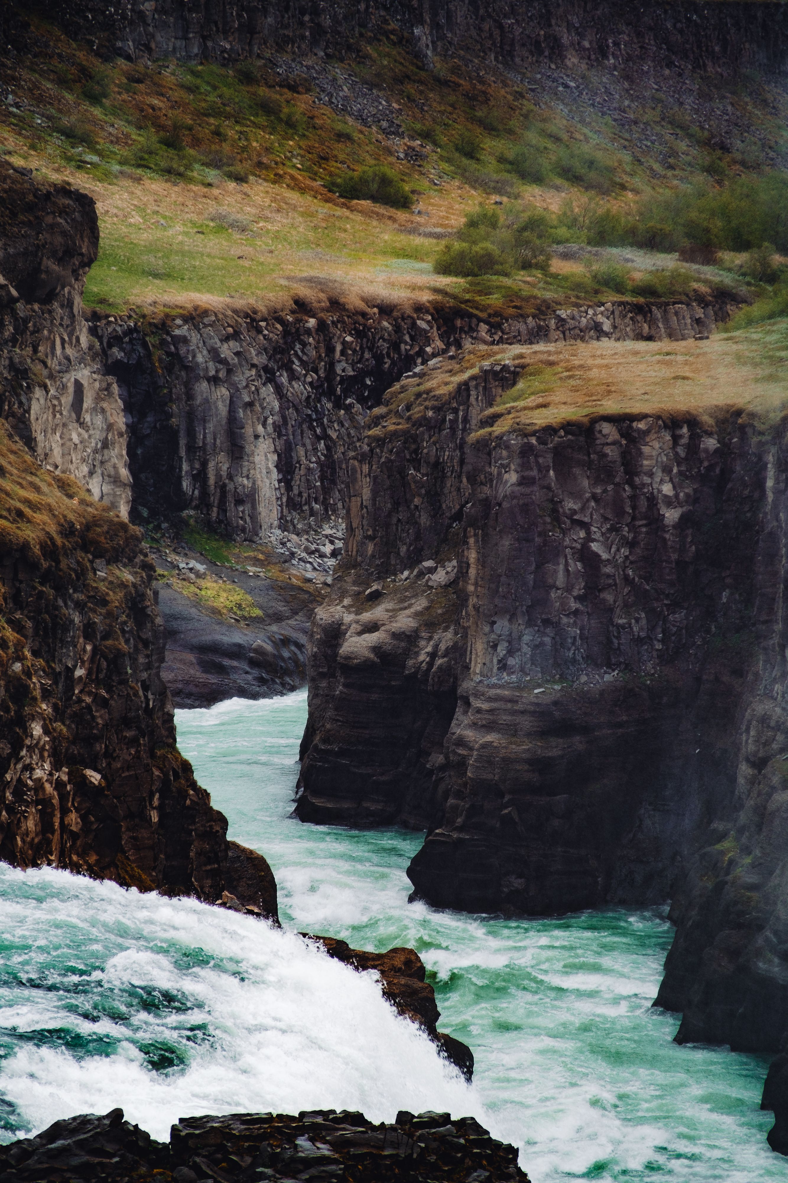 Breathtaking view of the powerful Gullfoss waterfall cascading through Iceland's Hvita canyon.