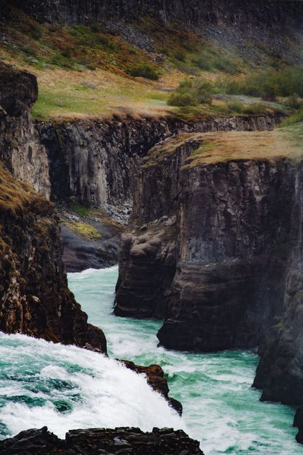 Breathtaking view of the powerful Gullfoss waterfall cascading through Iceland's Hvita canyon.
