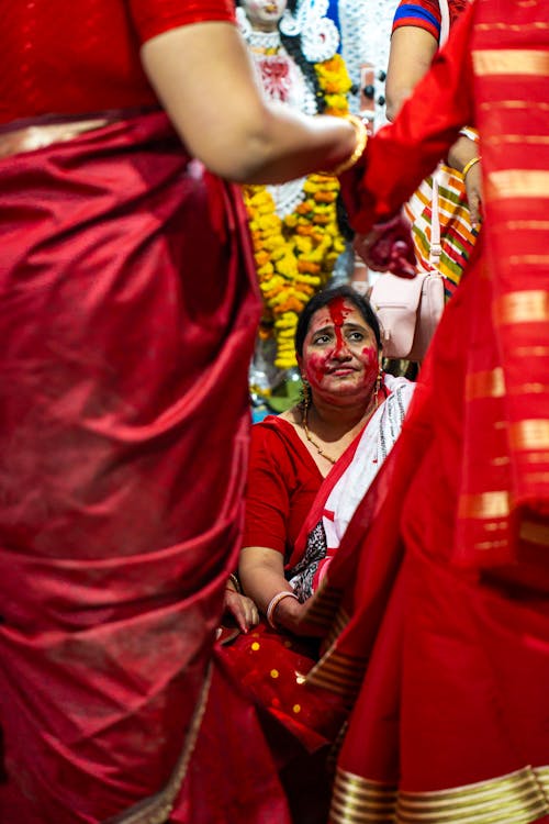 Women in Red, Traditional Clothing