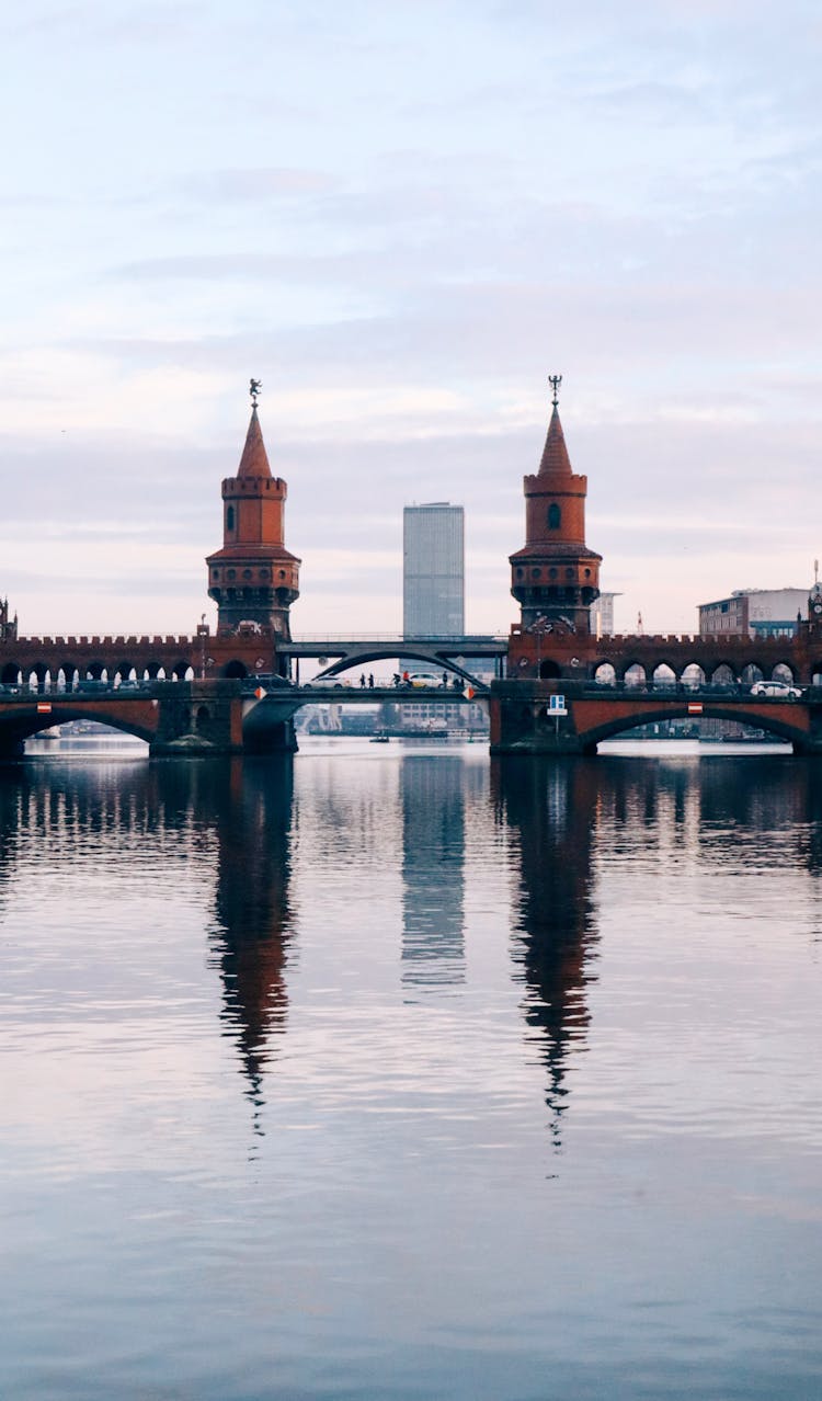 The Oberbaum Bridge Reflected In River In Berlin 