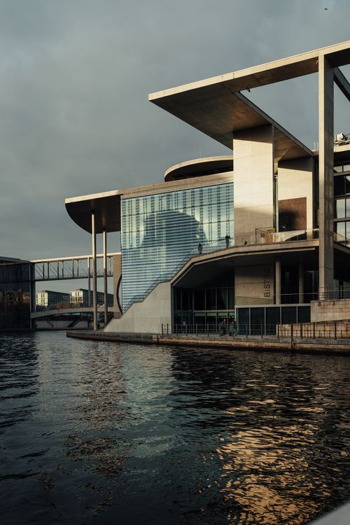 Free Stunning view of modern architecture reflecting over Berlin's waterfront. Captured during daylight. Stock Photo