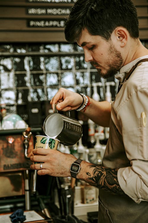 Free A Barista Preparing a Coffee Stock Photo