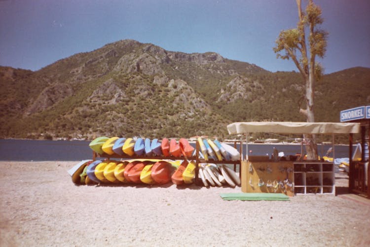 Film Photograph Of A Kayak Rental On The Beach 