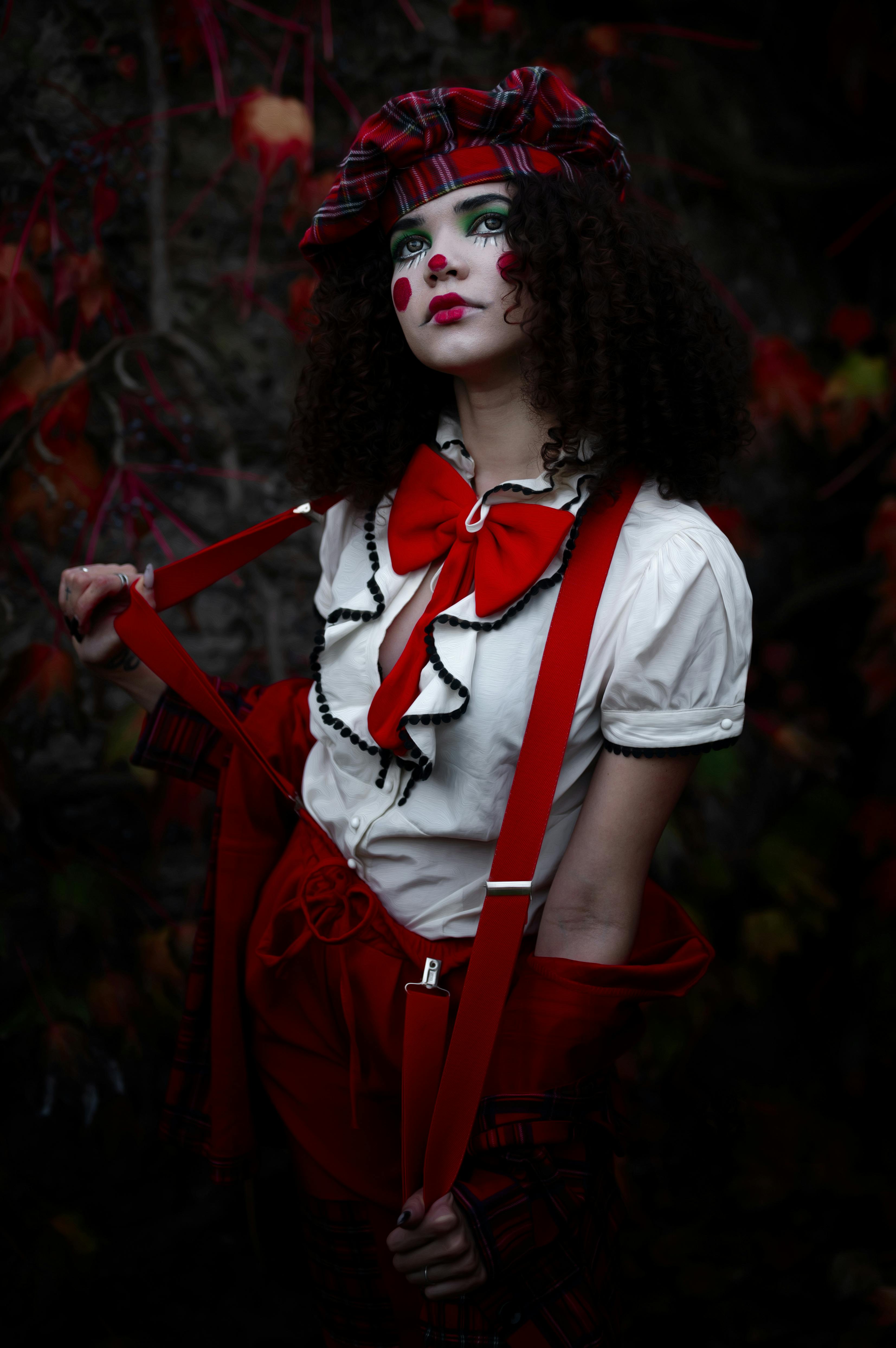 free photo of young woman in a clown costume