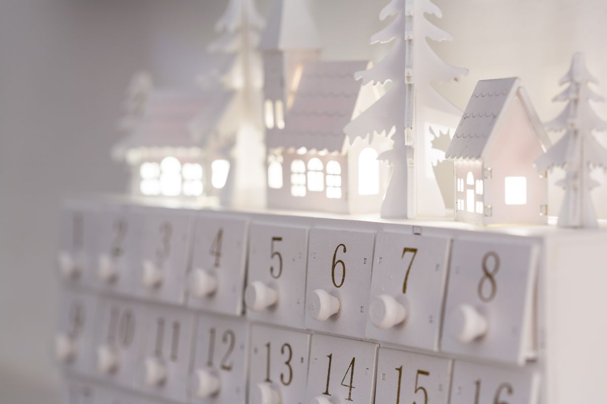 Christmas advent calendar ideas with a minimalist advent calendar with illuminated houses and numbers