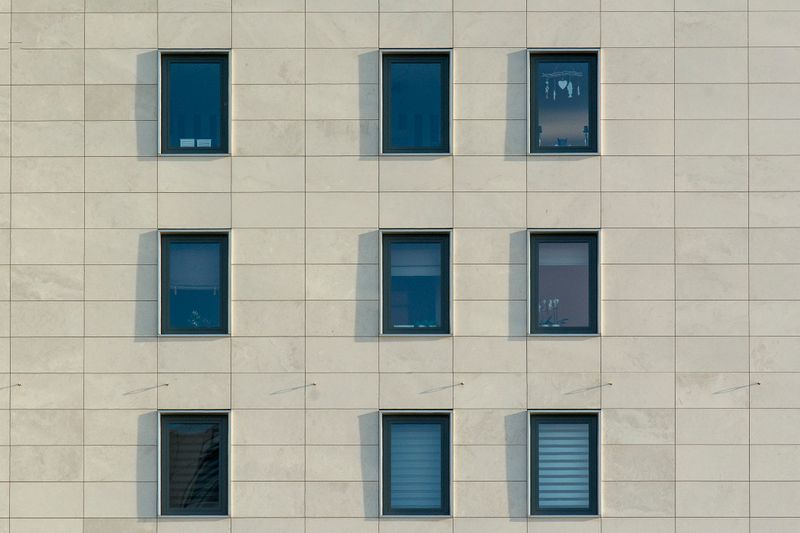 Grid pattern of windows on a modern office building facade