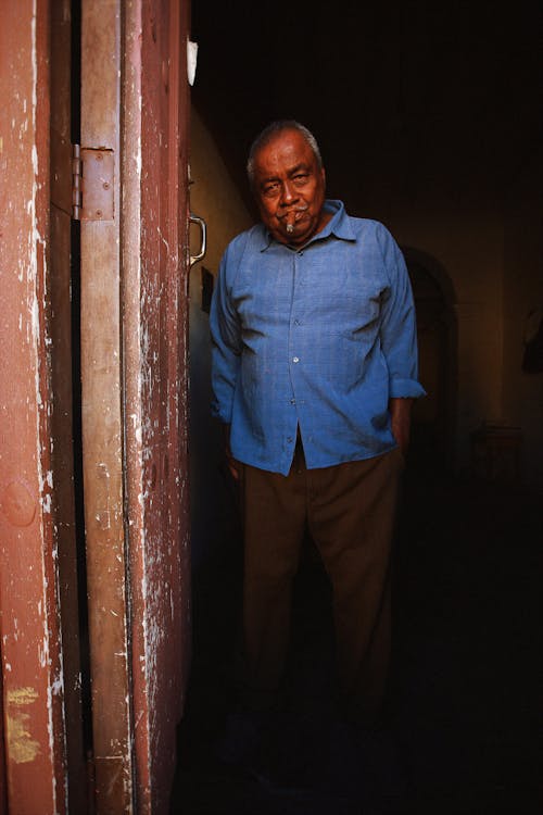 Elderly Man Smoking Cigar