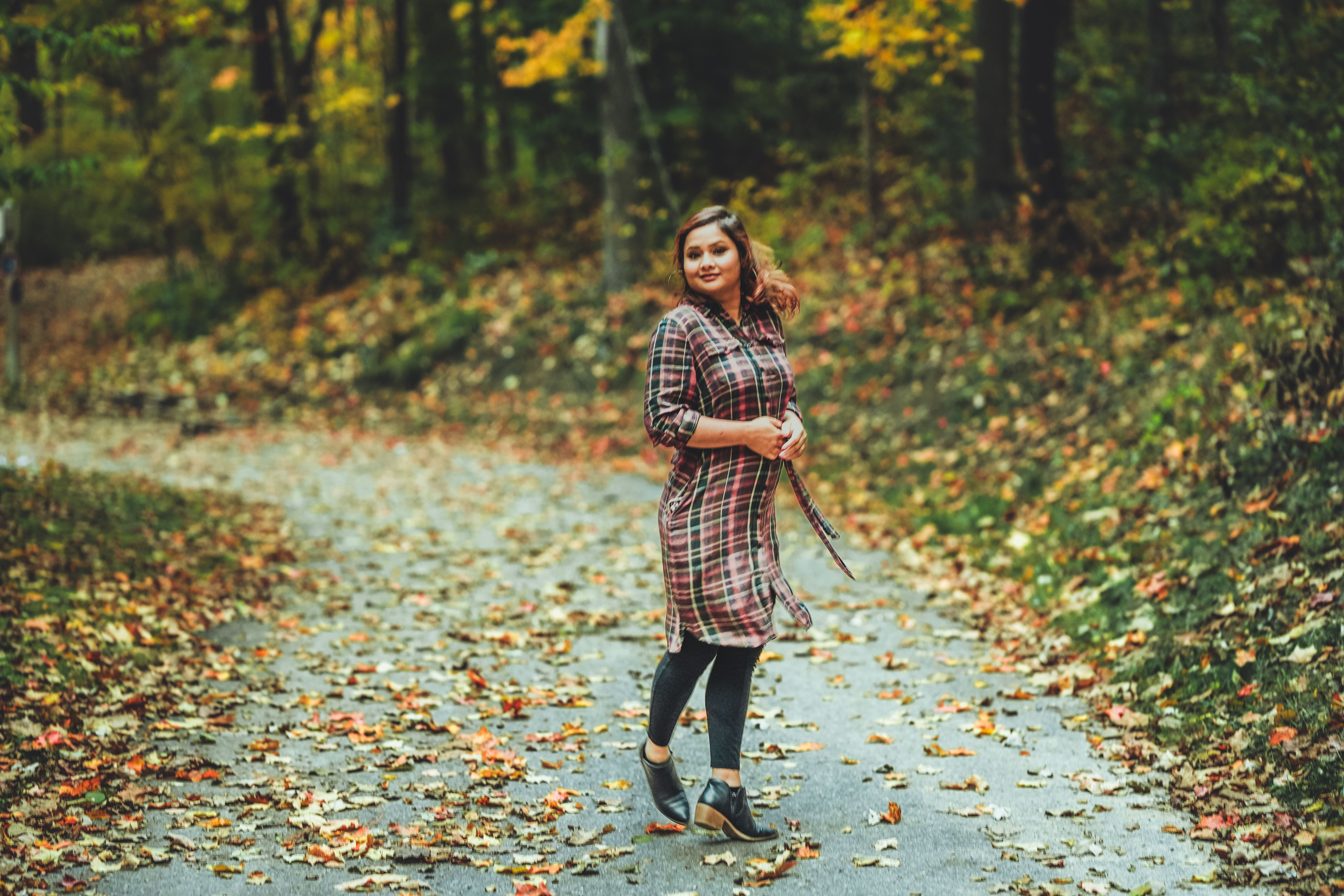 Woman Posing on Autumn Forest Path · Free Stock Photo