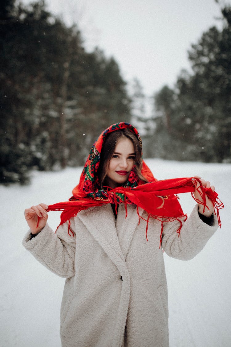 Woman In Coat And Shawl In Winter