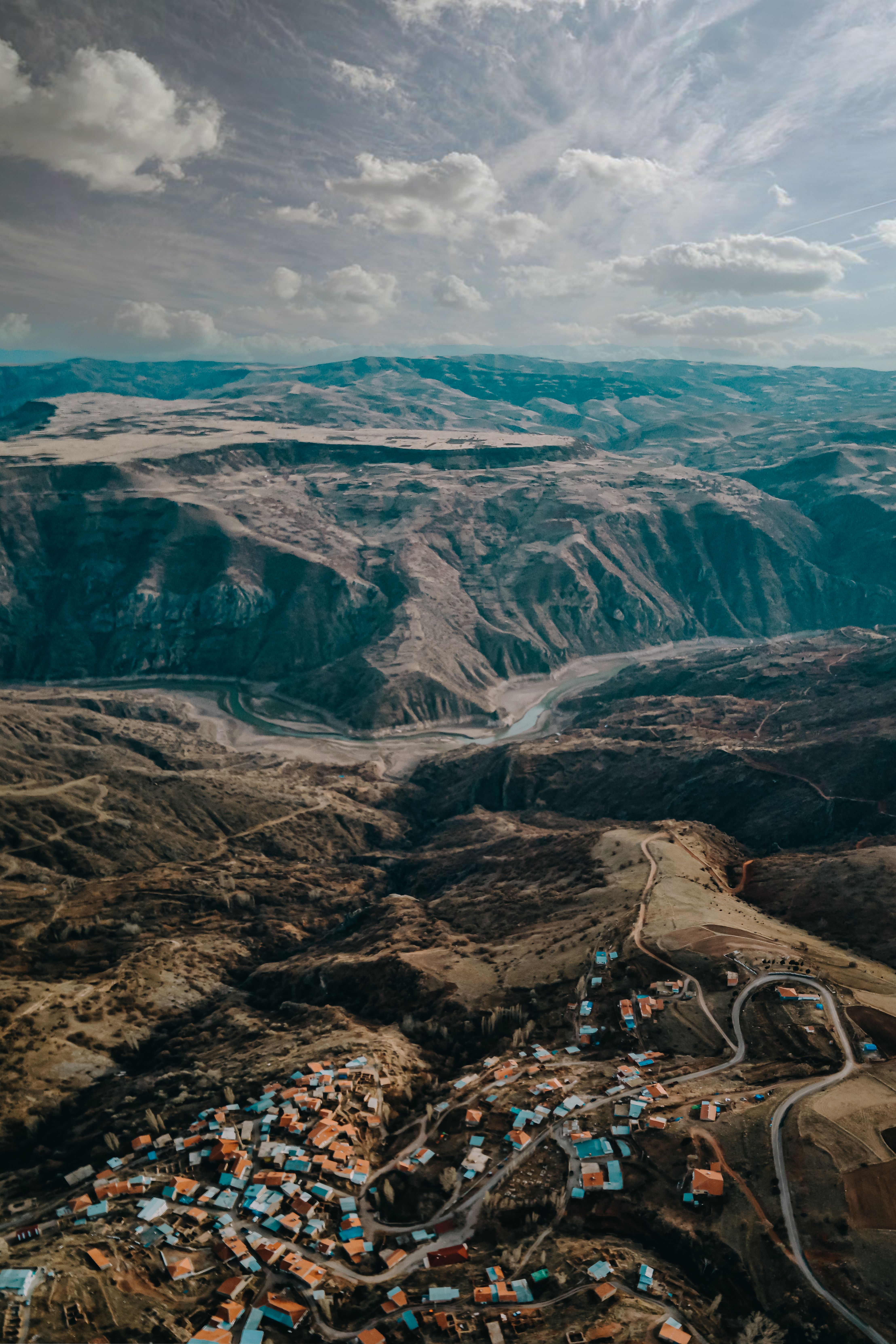 Aerial View of a Village in Mountains · Free Stock Photo