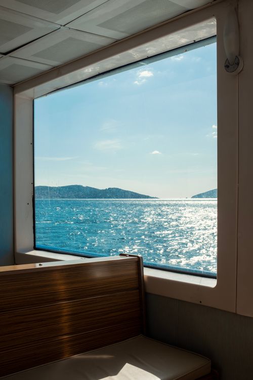 Free Capture of a serene sea view through a ferry window in Büyükada, İstanbul. Stock Photo