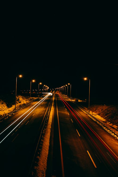 A Highway at Night Photographed in Long Exposure 