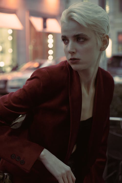 Portrait of a Female Model Wearing a Red Jacket