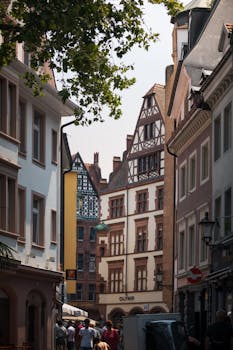 Charming view of historic half-timbered houses in Freiburg, Germany.