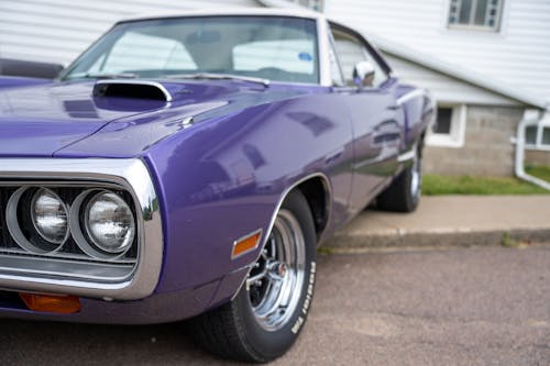A Vintage Purple Dodge Standing on the Street