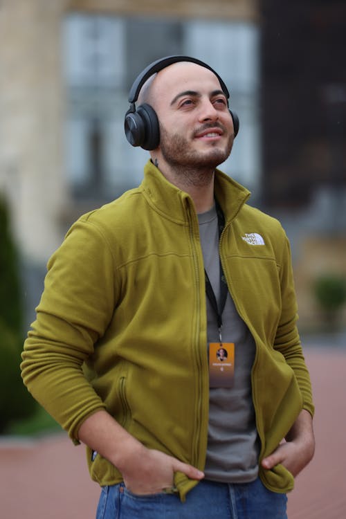 Portrait of Bald Man Wearing Headphones 