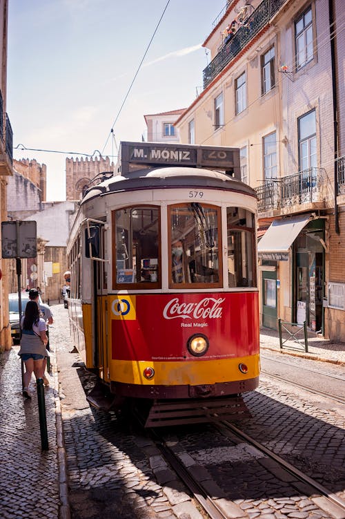 Tram and People on City Street