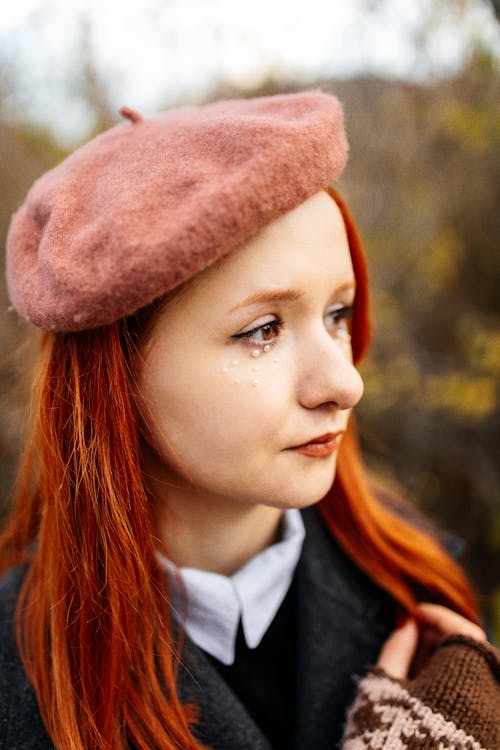 Redhead Woman in Beret in Nature