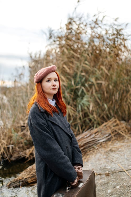 Redhead Woman in Coat and Beret