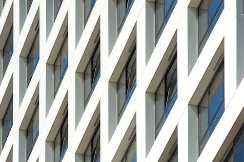 Бесплатное стоковое фото с геометрический, городской, окна