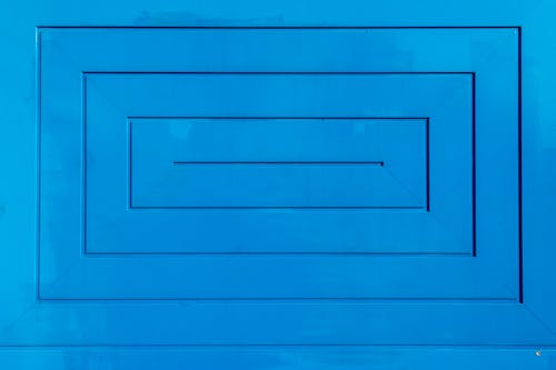 Geometrical Figures on Blue Wall