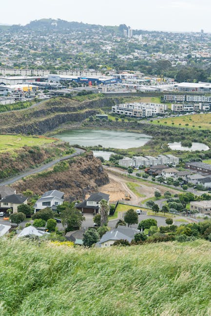 An aerial view of Auckland city, with highlighted areas indicating potential archaeological sites.