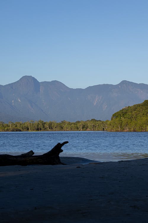 Silhouette of Mountains by the Sea 