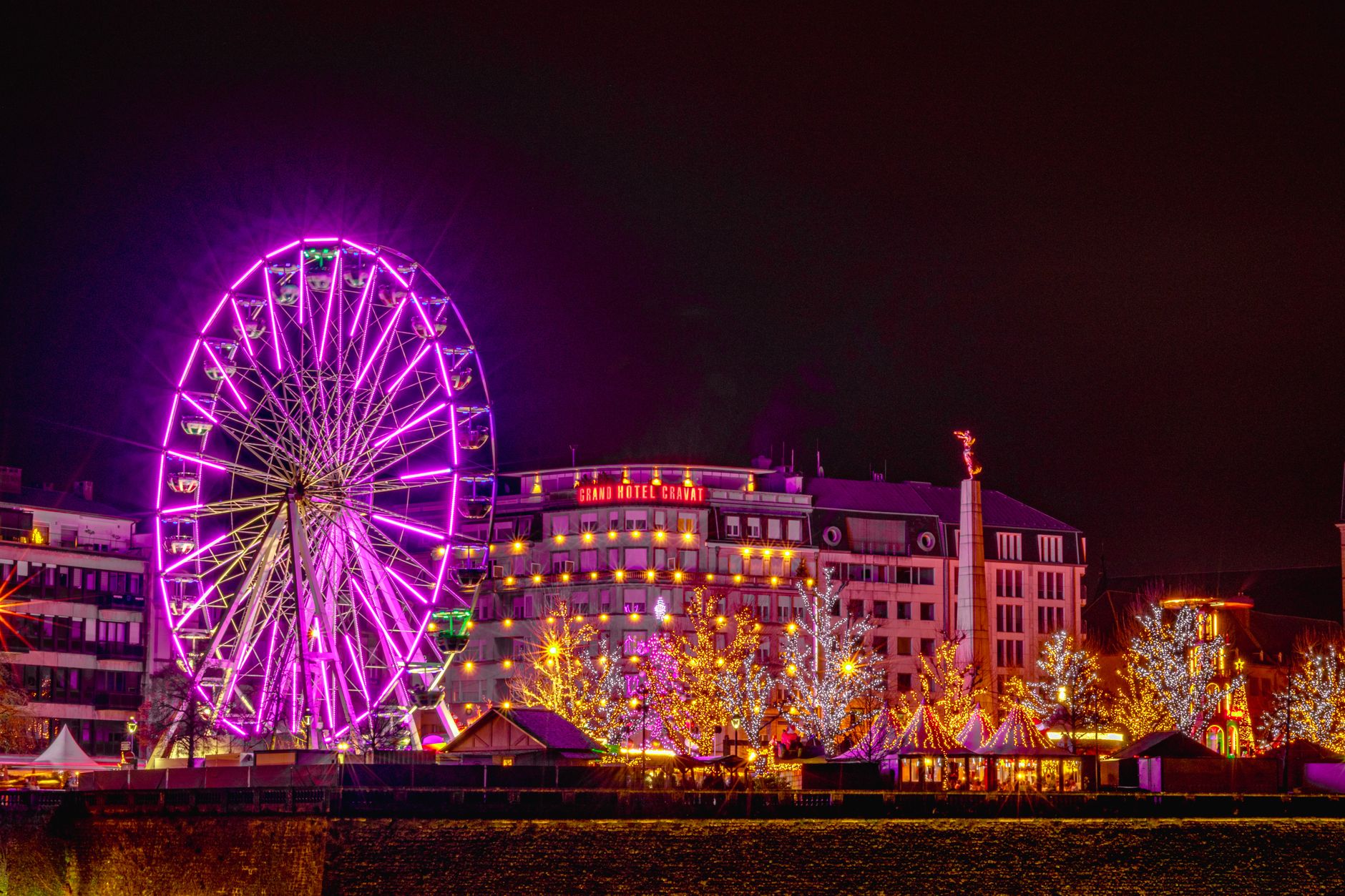 Schueberfouer funfair lights on the Glacis field at night