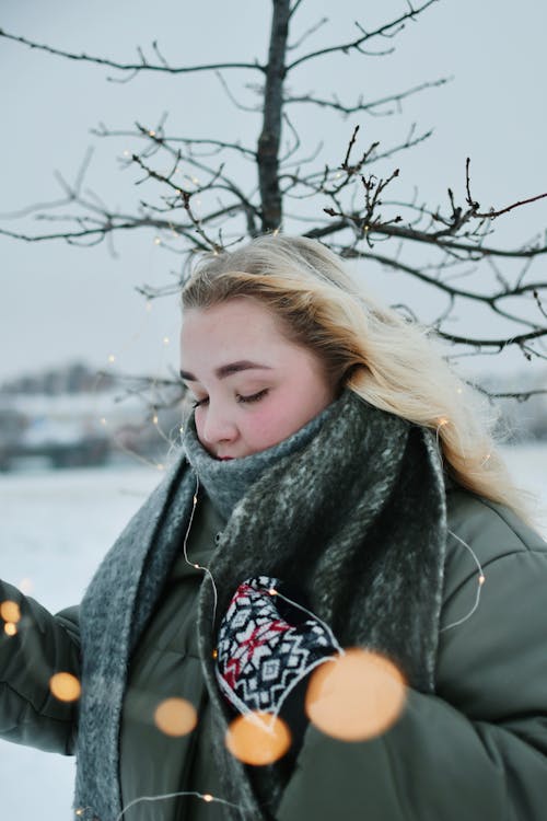 Blonde Woman in Scarf Looking Down