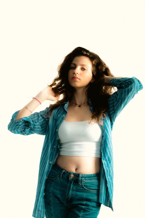 Studio Shot of a Young Woman in a Trendy Outfit 