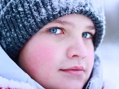 Little Boy in Beanie Looking at Camera